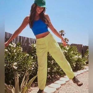 Free People Movement Pants Size Medium Mesmerize Me Festival Rave Yellow $108